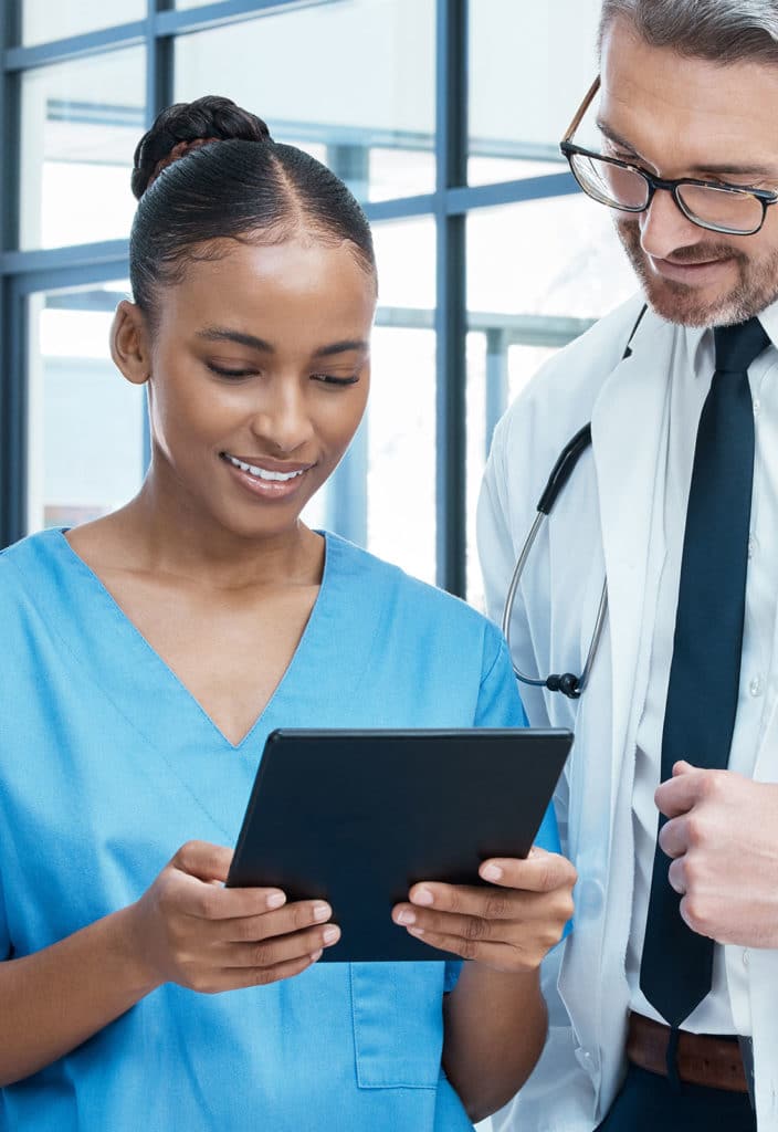 Doctor, nurse and digital tablet in a hospital