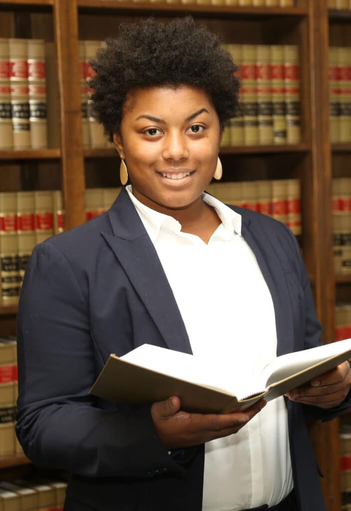 Female lawyer in law library